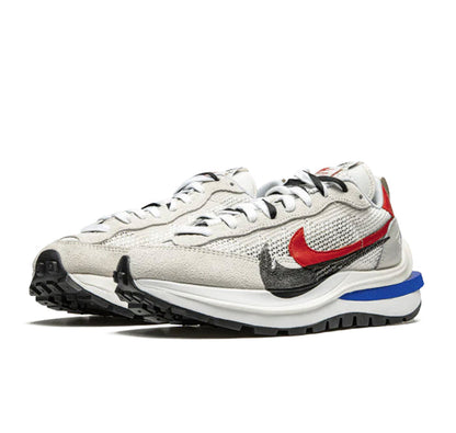 Nike Vaporwaffle Sacai "Sport Fuchsia Game Royal"